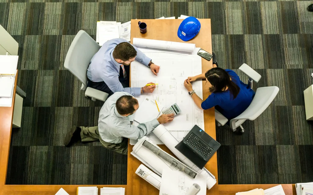 A group of people meeting about construction.